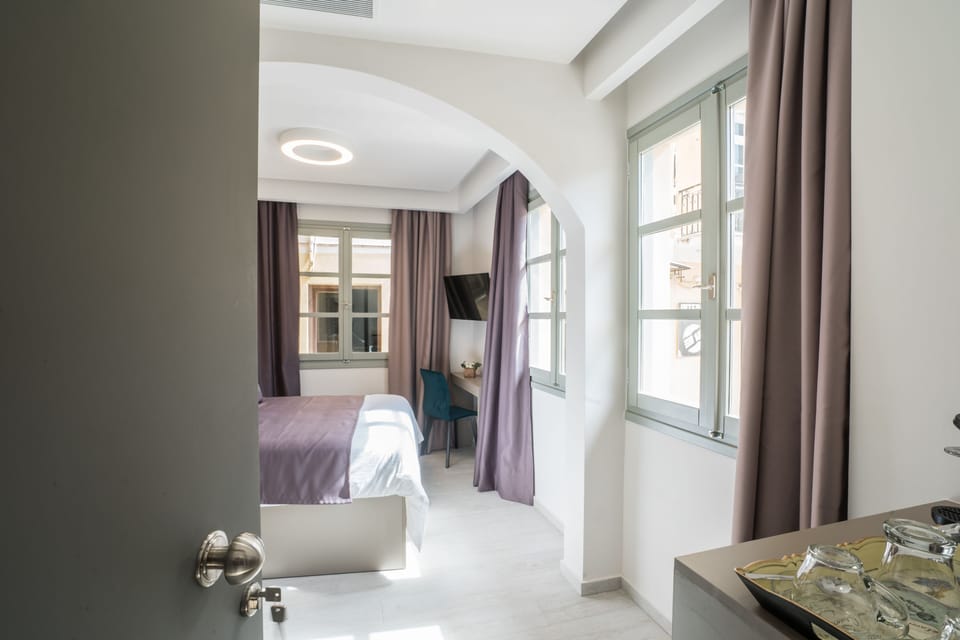 Economy Double Room, Ground Floor | Desk, iron/ironing board, free WiFi, bed sheets