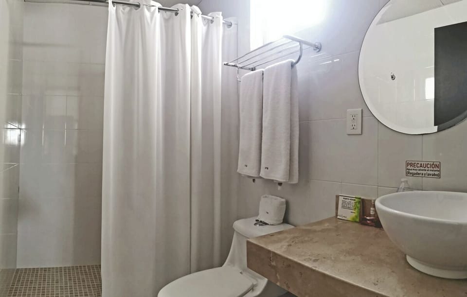 Shower, free toiletries, hair dryer, towels