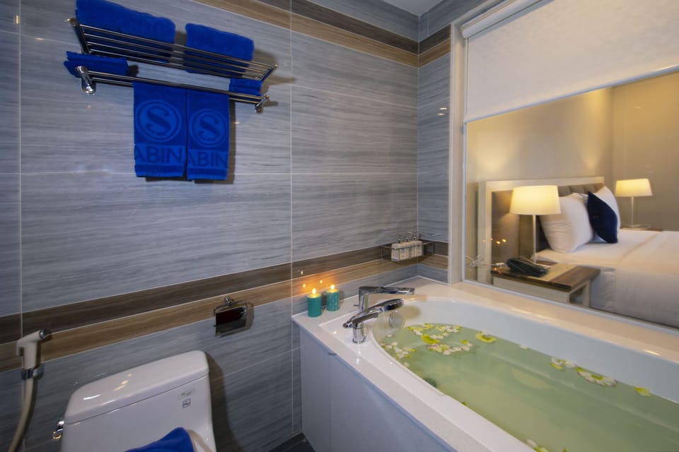 Suite Double with Bathtub | Bathroom | Shower, rainfall showerhead, hair dryer, bathrobes