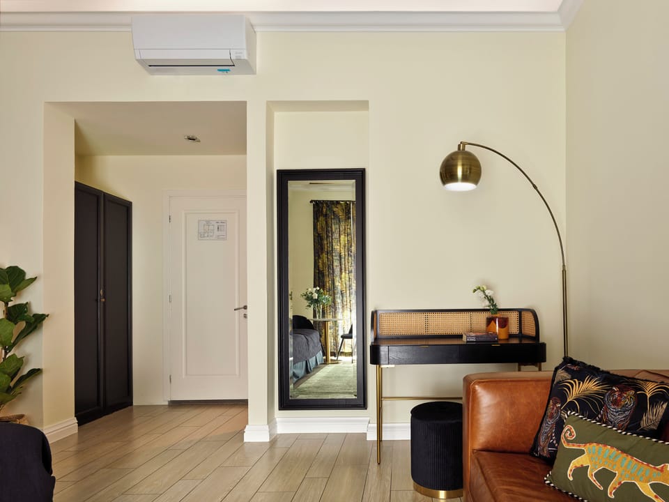 Standard Triple Room | Minibar, in-room safe, desk, soundproofing