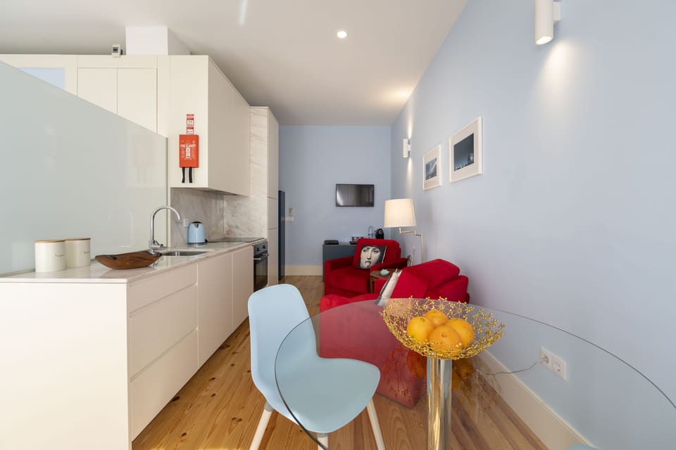 Design Apartment, 1 Bedroom, City View | Living area | 32-inch Smart TV with cable channels, TV, streaming services