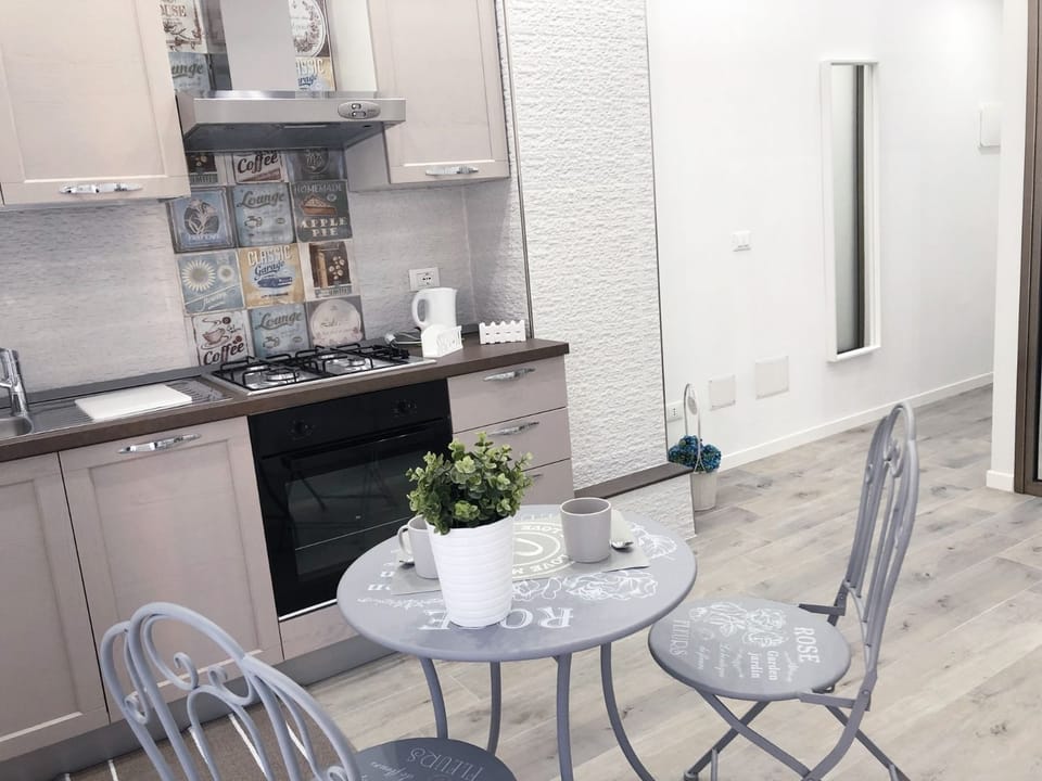 Deluxe Room, Balcony, City View (Smile) | In-room dining
