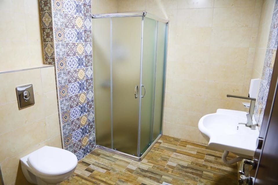 Shower, free toiletries, slippers, bidet
