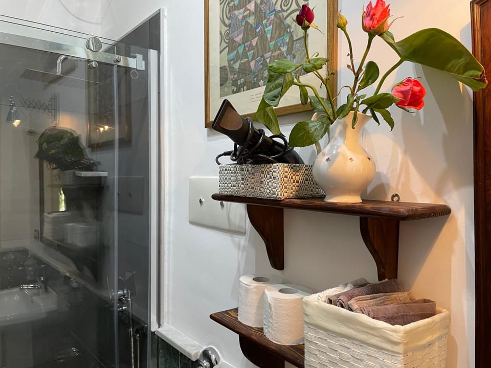 Shower, free toiletries, hair dryer, bathrobes
