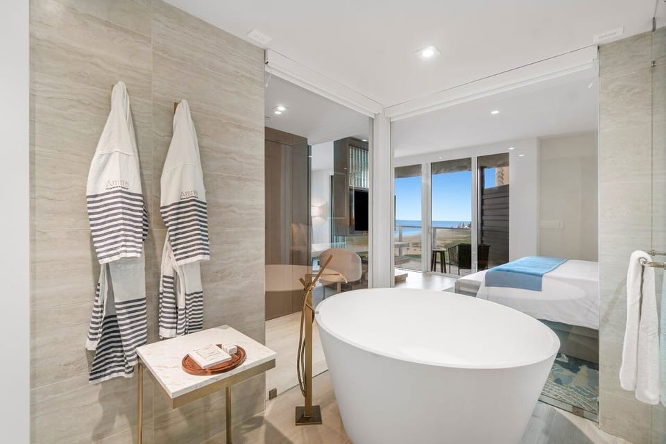 Grand Room, 1 King Bed, Ocean View (Grand) | Bathroom | Separate tub and shower, deep soaking tub, designer toiletries