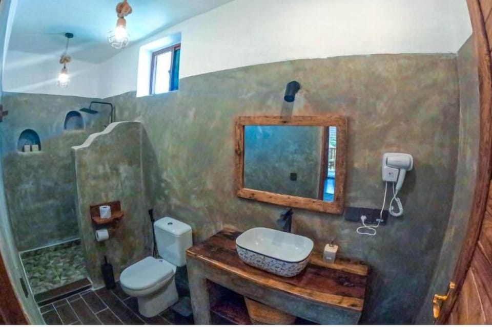 Family Bungalow, 2 Queen Beds, Garden View | Bathroom | Shower, hydromassage showerhead, hair dryer, bidet