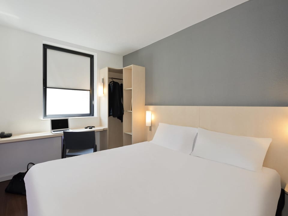 Twin Room, 2 Twin Beds | Desk, soundproofing, iron/ironing board, free cribs/infant beds