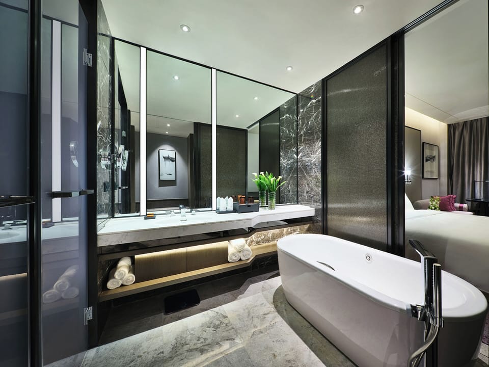 Separate tub and shower, bathrobes, slippers