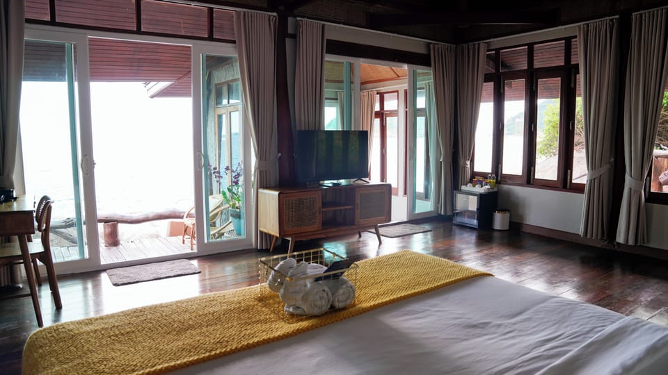 Panoramic Seafront Villa | Minibar, desk, laptop workspace, blackout drapes