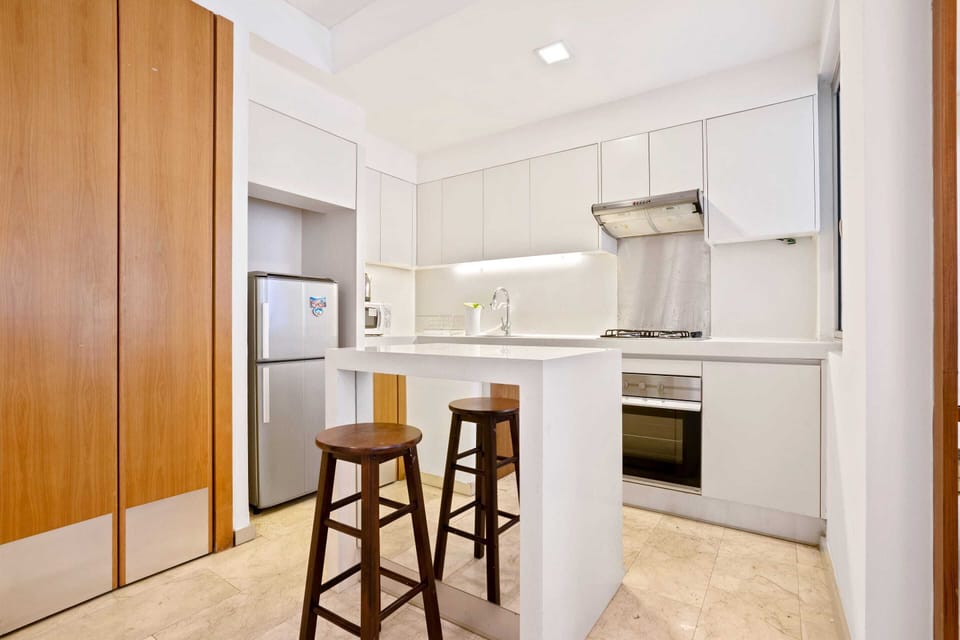 City Apartment | Private kitchen | Full-size fridge, microwave, stovetop, coffee/tea maker