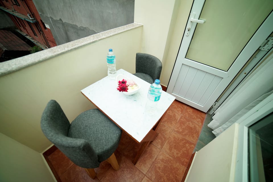 Super Deluxe Twin with Terrace | Living area | Flat-screen TV
