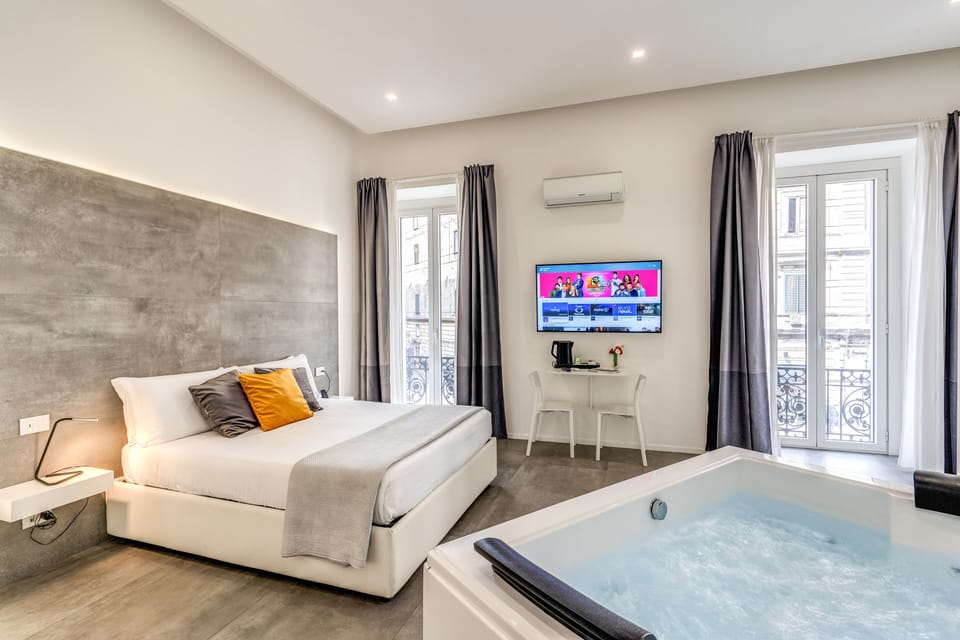 Deluxe Suite, Sauna | 1 bedroom, premium bedding, minibar, in-room safe