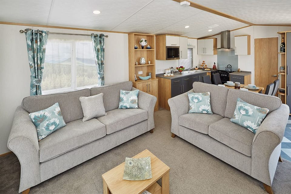 Superior Caravan 2 | Living area | Flat-screen TV, fireplace