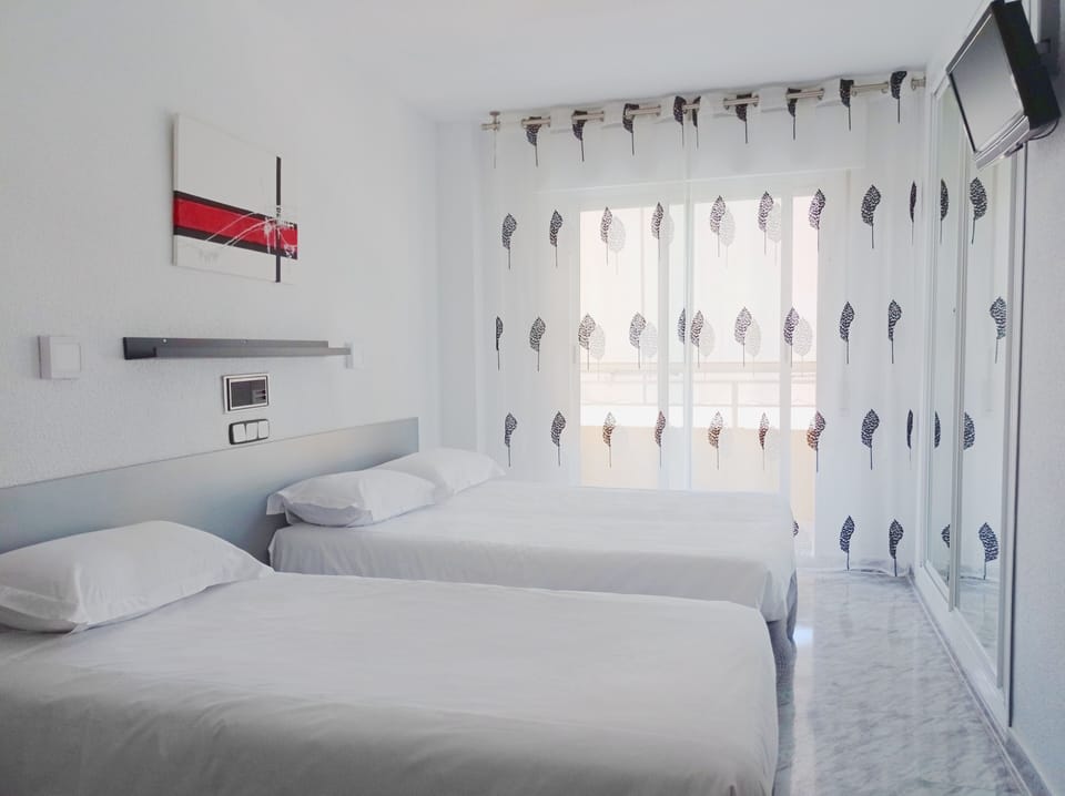 Family Triple Room, Balcony | Free WiFi, bed sheets