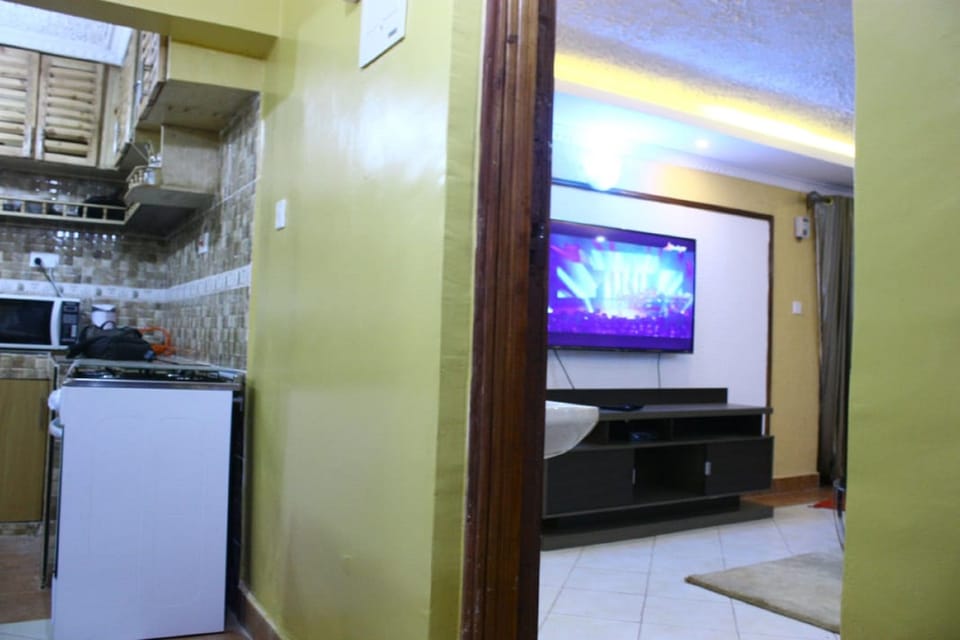 Apartment, 2 Bedrooms | Living area | 32-inch flat-screen TV with satellite channels, TV