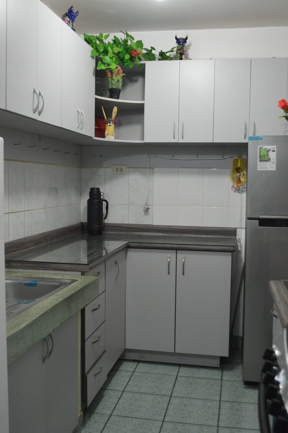 Economy Apartment, Multiple Beds | Private kitchen | Full-size fridge, microwave, oven, cookware/dishes/utensils