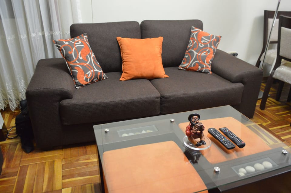 Economy Apartment, Multiple Beds | Living area | LED TV