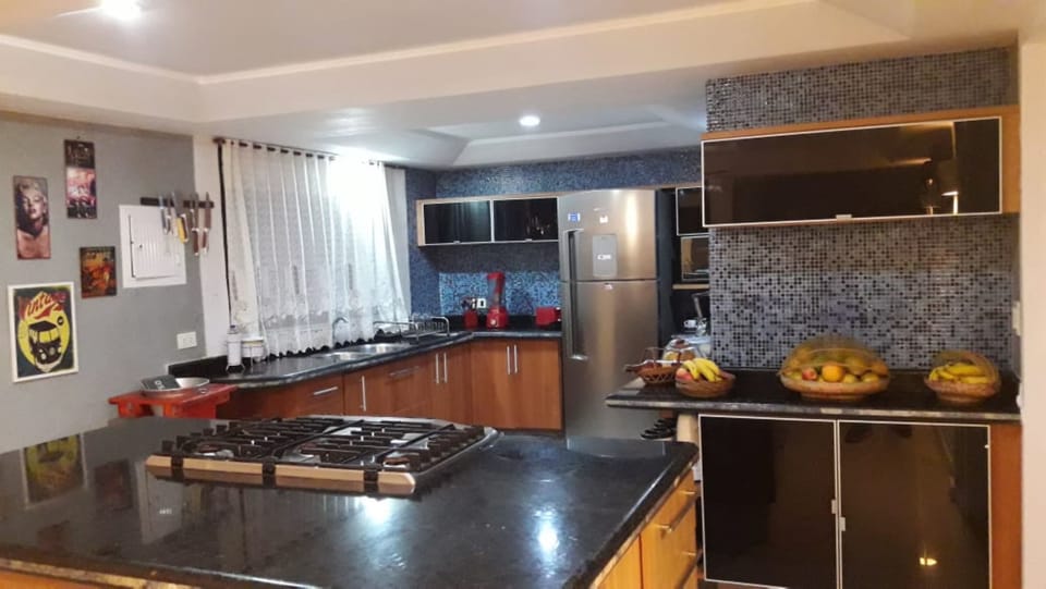 House, Multiple Beds | Private kitchen | Fridge, microwave, oven, cookware/dishes/utensils