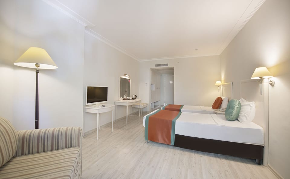 Premium bedding, free minibar, in-room safe, iron/ironing board