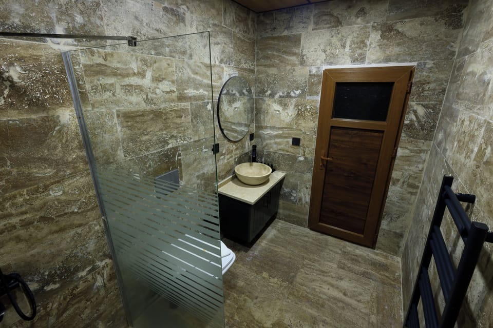Shower, free toiletries, hair dryer, slippers