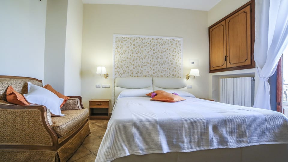 Double Room, Balcony, City View | Premium bedding, in-room safe, desk, laptop workspace