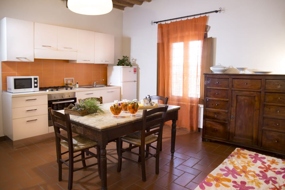 Apartment, 1 Bedroom (Verde) | Private kitchen | Full-size fridge, microwave, stovetop, dishwasher