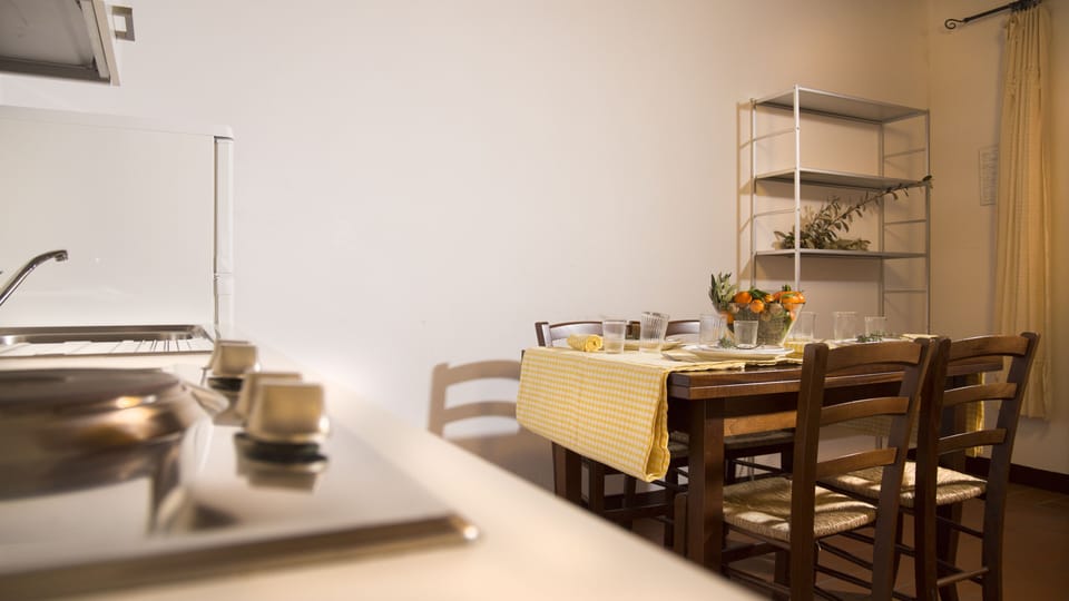 Apartment, 1 Bedroom (Sabbia) | Private kitchen | Full-size fridge, microwave, stovetop, dishwasher