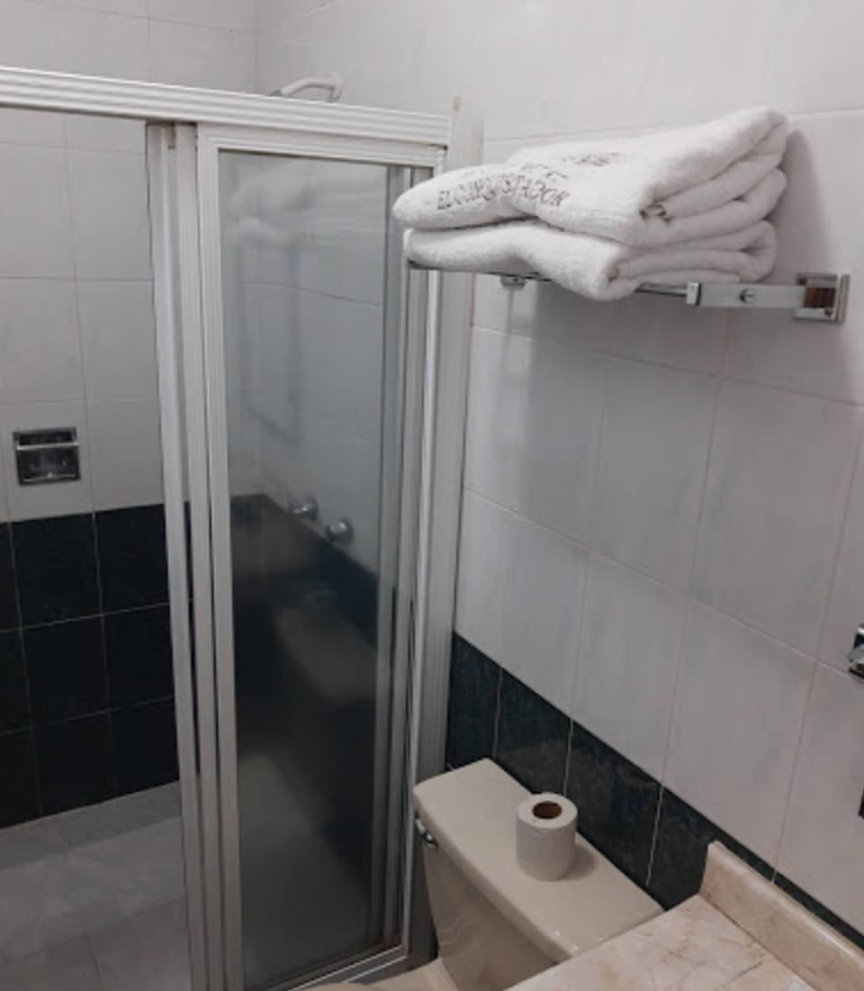 Shower, free toiletries, towels, soap