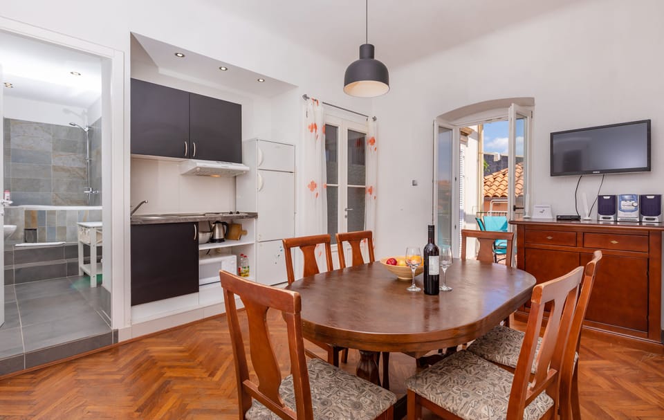 Standard Apartment | Living area | Flat-screen TV