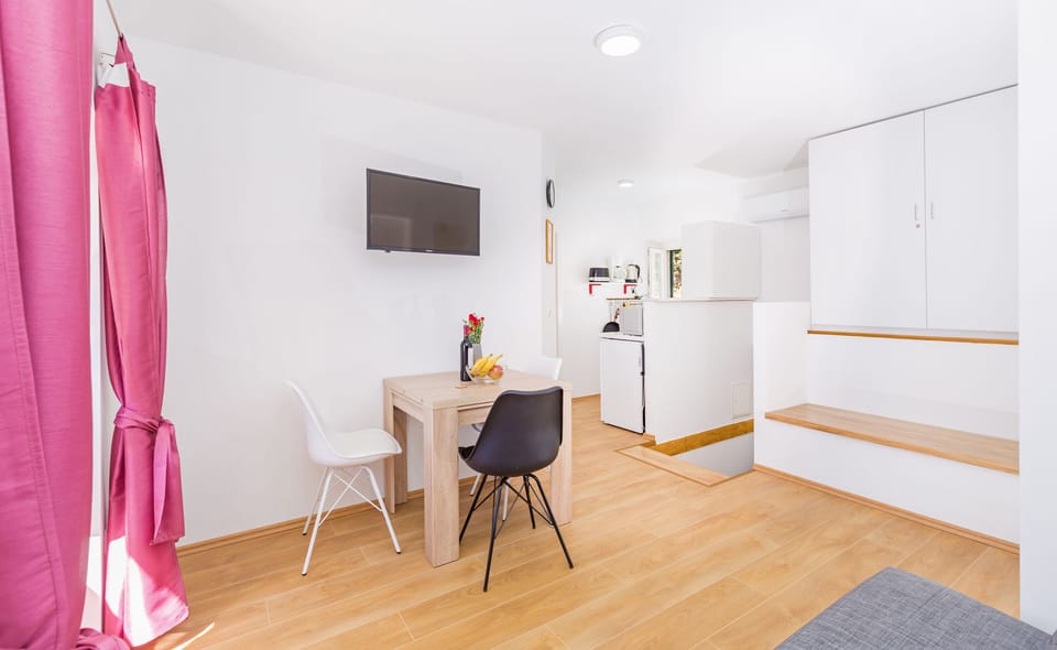 Standard Apartment | Living area | Flat-screen TV