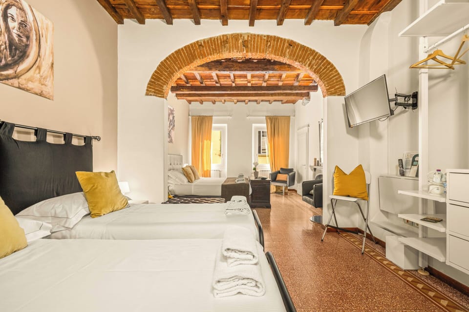 Deluxe Room, 1 Bedroom, City View | In-room safe, soundproofing, iron/ironing board, free WiFi