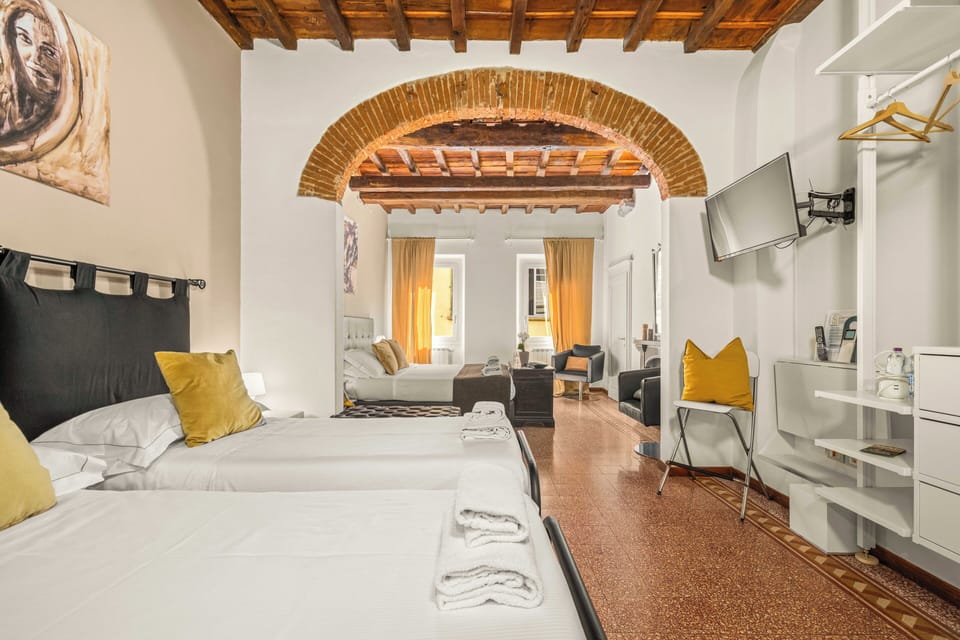 Deluxe Room, 1 Bedroom, City View | In-room safe, soundproofing, iron/ironing board, free WiFi