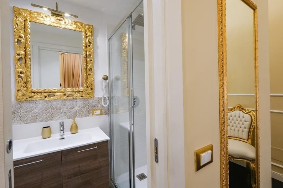 Shower, free toiletries, hair dryer, slippers