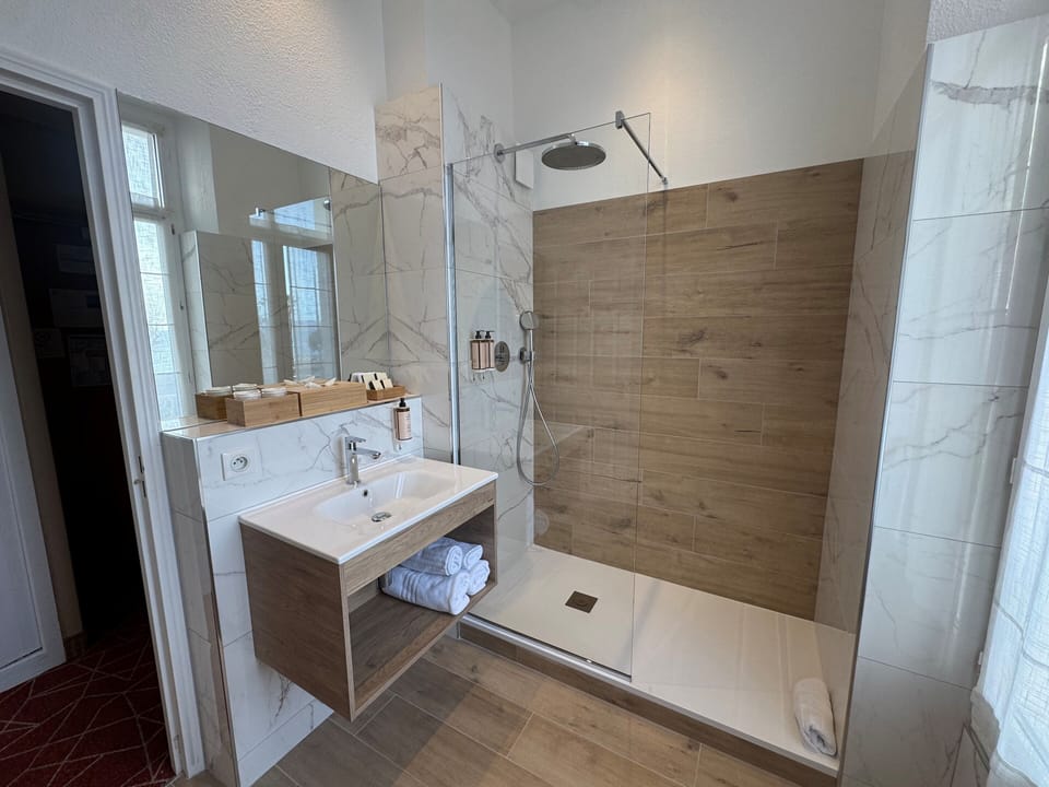 Luxury Double or Twin Room, Sea View | Bathroom | Hair dryer, towels