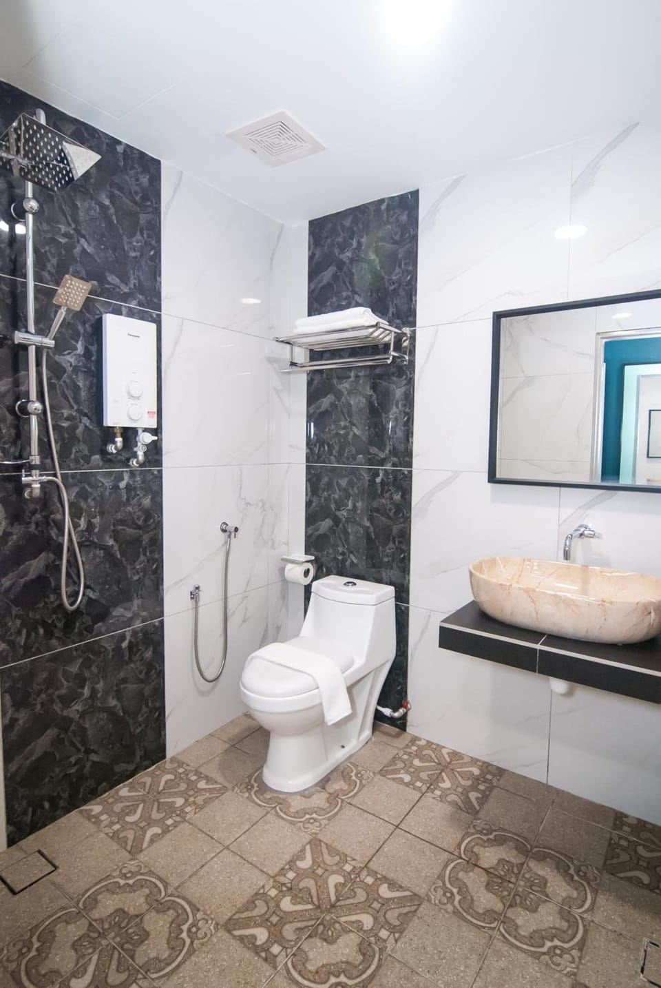 Shower, free toiletries, hair dryer, slippers