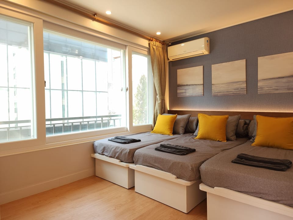 Triple Room, Courtyard View | Individually decorated, individually furnished, desk, iron/ironing board
