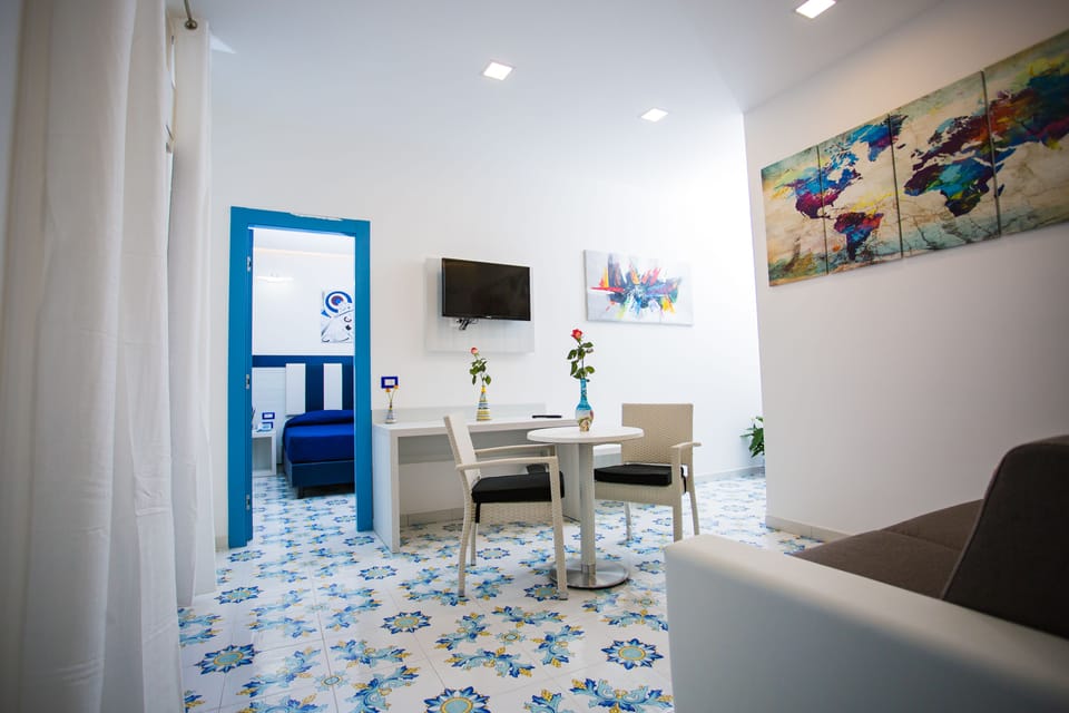 Exclusive Quadruple Room, Courtyard View (Intrigante) | Premium bedding, down comforters, memory foam beds, minibar