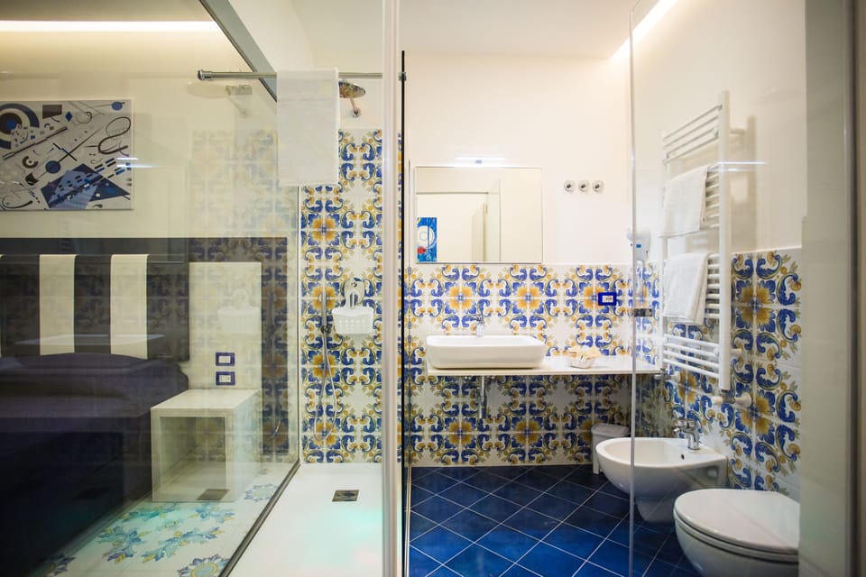 Exclusive Quadruple Room, Courtyard View (Intrigante) | Premium bedding, down comforters, memory foam beds, minibar