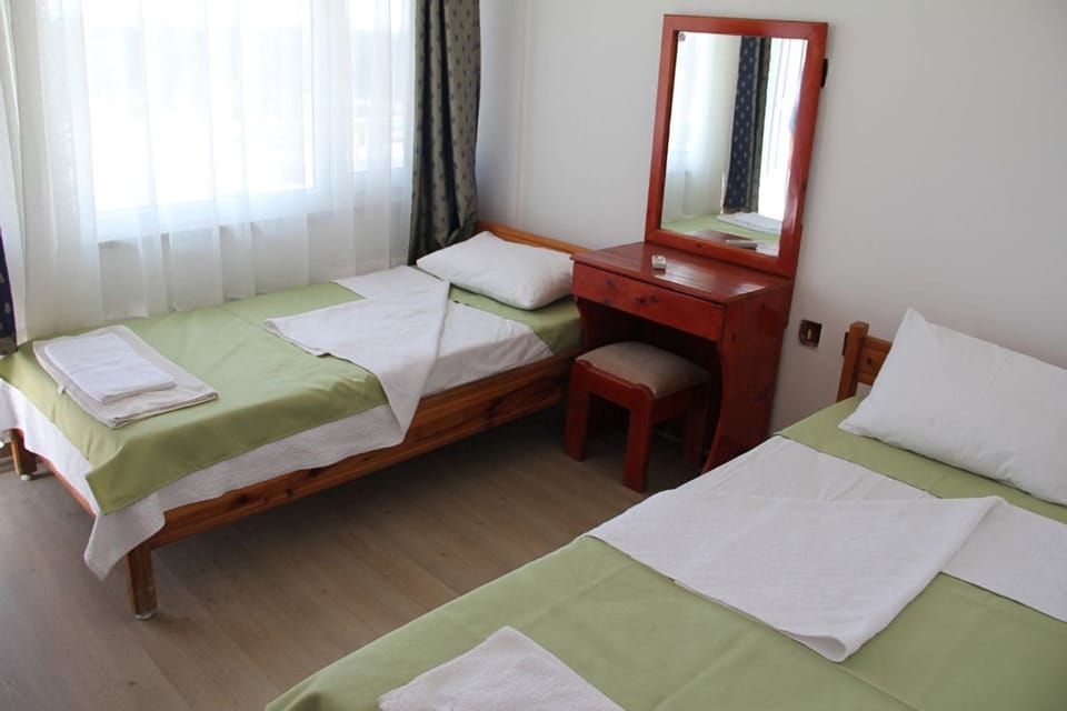 Standard Triple Room | 1 bedroom, in-room safe, desk, blackout drapes