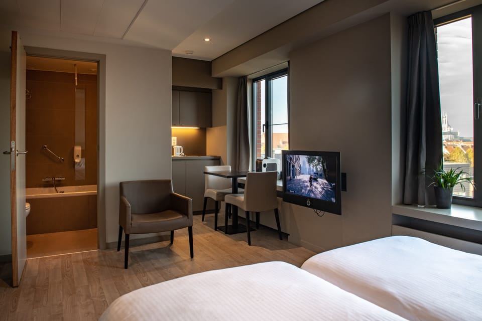Twin Room, Kitchenette | Premium bedding, in-room safe, individually decorated, laptop workspace