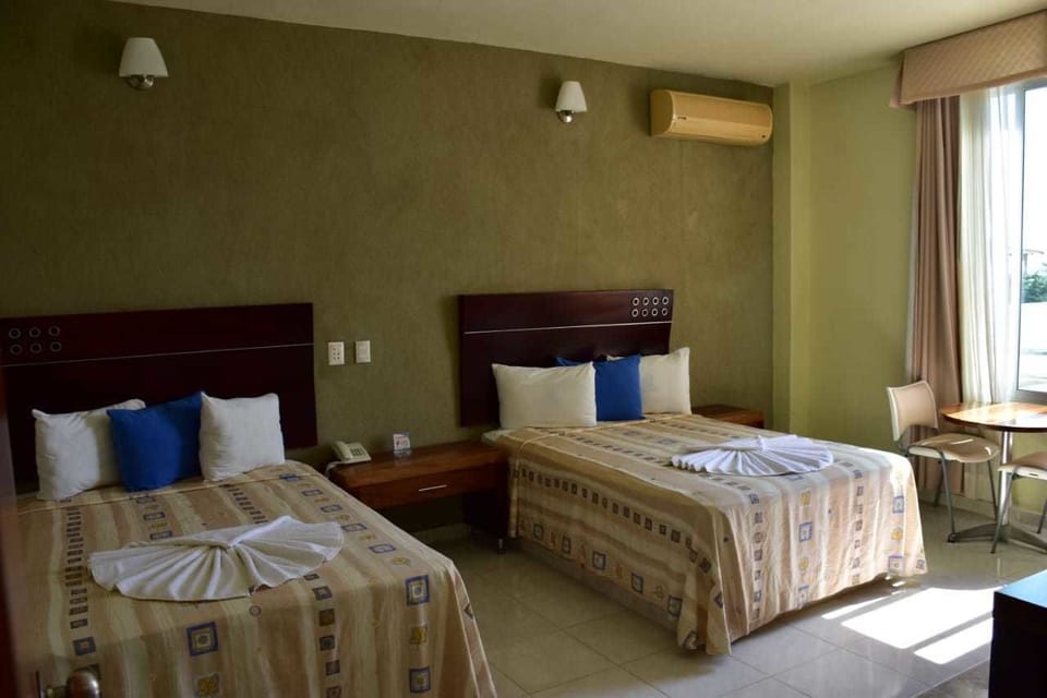 Basic Double or Twin Room, 2 Double Beds, Beach View | Desk, blackout drapes, iron/ironing board, bed sheets