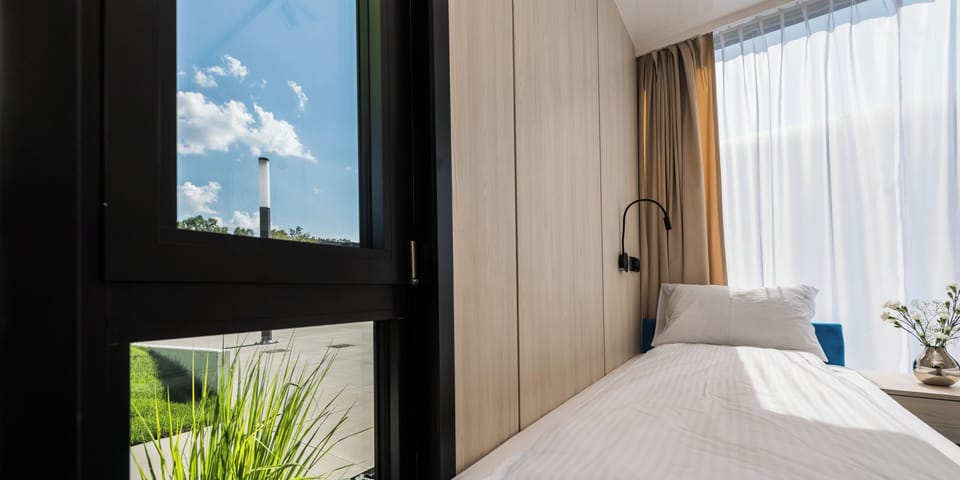 Suite, Multiple Beds, Non Smoking | In-room safe, soundproofing, iron/ironing board, free WiFi
