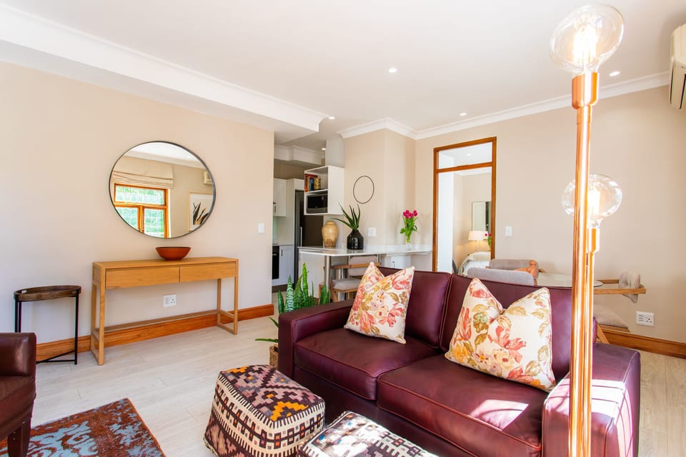 Luxury Apartment, Balcony, Mountain View | Living area | 50-inch Smart TV with cable channels, TV