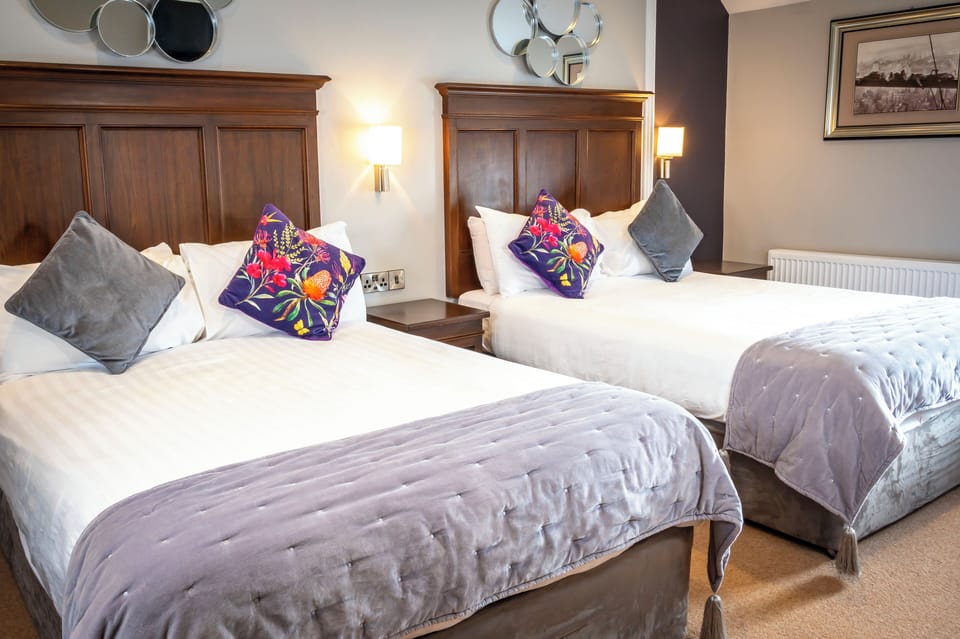 Standard Quadruple Room, 2 Double Beds | Iron/ironing board, free WiFi