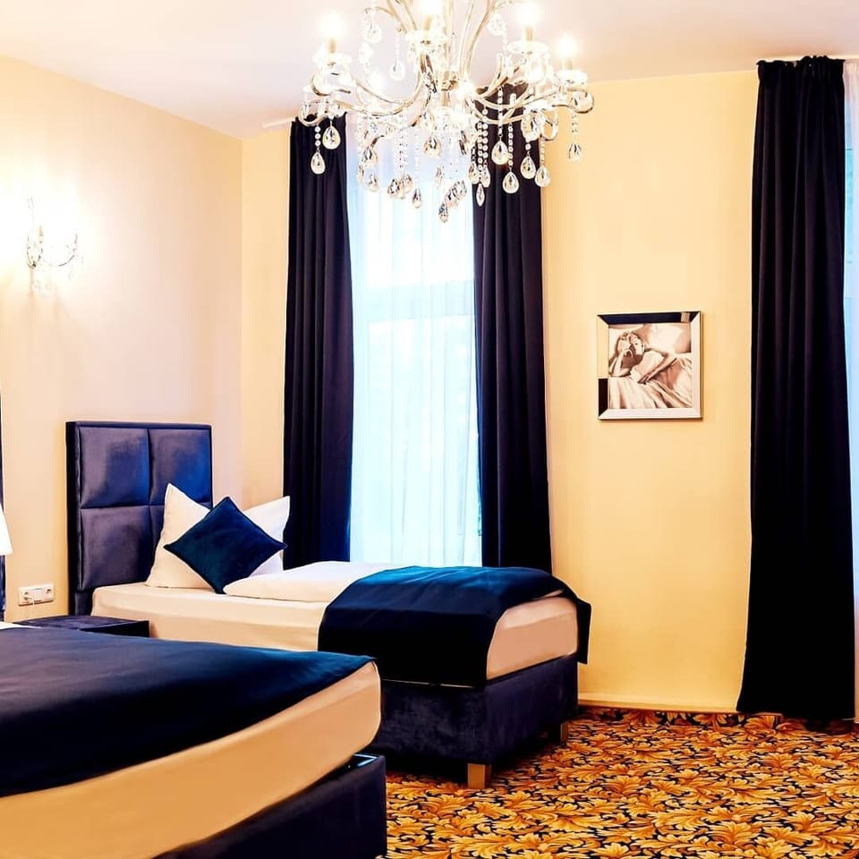 Deluxe Room (4 Persons) | Soundproofing, free WiFi, bed sheets
