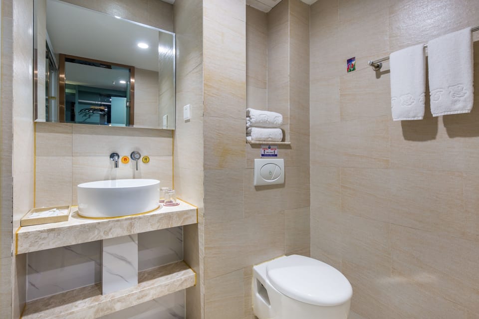 Shower, free toiletries, hair dryer, slippers