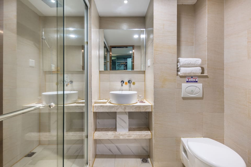 Shower, free toiletries, hair dryer, slippers