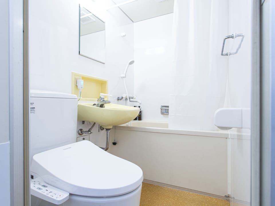 Hair dryer, towels, soap, shampoo