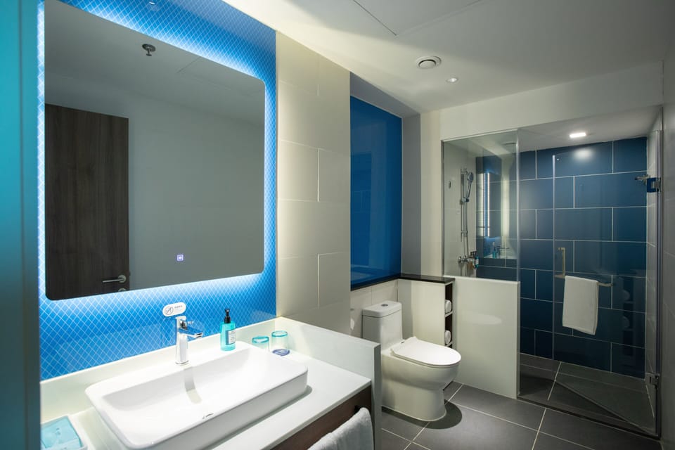 1 King Standard | Bathroom | Hair dryer, slippers, towels