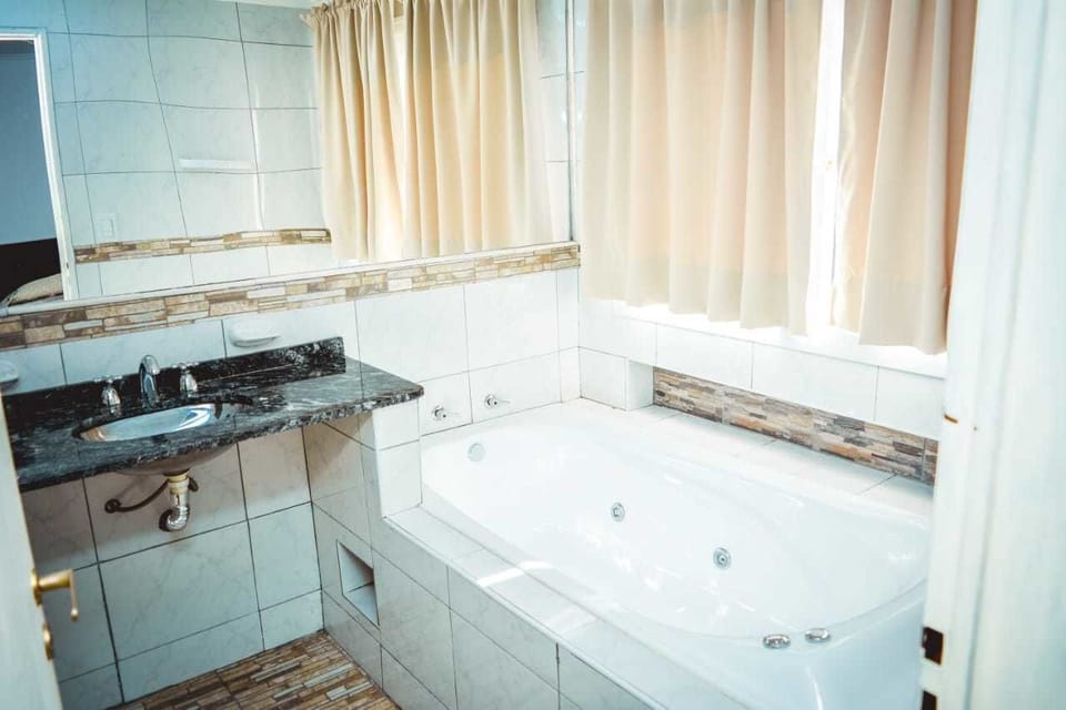 Superior Quadruple Room | Bathroom | Shower, free toiletries, towels, soap
